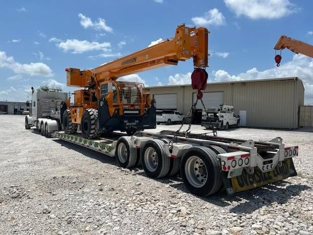 Mobile crane secured on an AJC oversize-load lowboy trailer