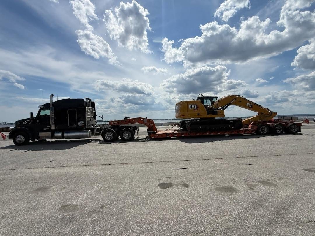Cat excavator · drop-deck