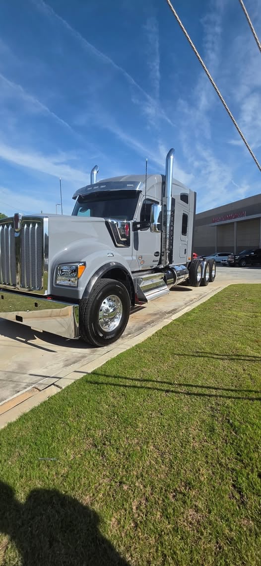 Polished Kenworth W990 day cab with chrome stacks